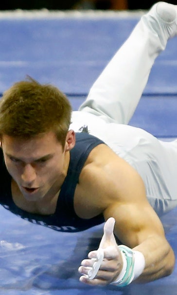 Mikulak picks himself up mat (literally), wins U.S. championship